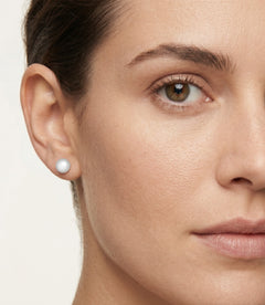 Ball white gold stud earrings