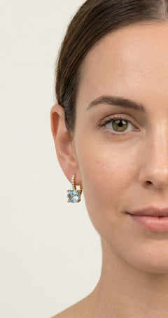 Blue topaz and cubic zirconia gold earrings