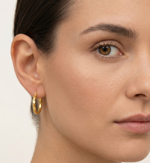 Yellow gold high polished hoop earring