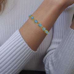 Classic Yellow Gold Bracelet with Blue Opals