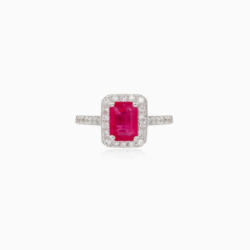 White gold ring with ruby and halo of diamonds