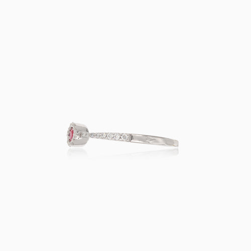 Fine ruby white gold ring with diamond halo