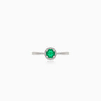 White gold diamond ring with round emerald