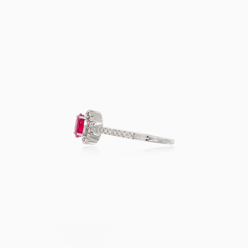 White gold ruby ring with diamond halo