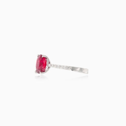 White gold ring with oval ruby and diamonds