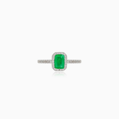 Beautiful white gold diamond ring with emerald
