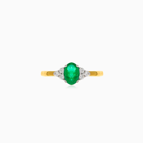 Elegant 18kt gold diamond and oval emerald ring