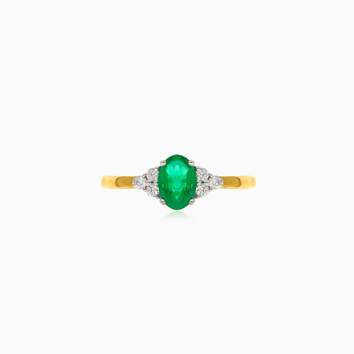 Bague élégante en or 18 carats avec diamant et émeraude ovale