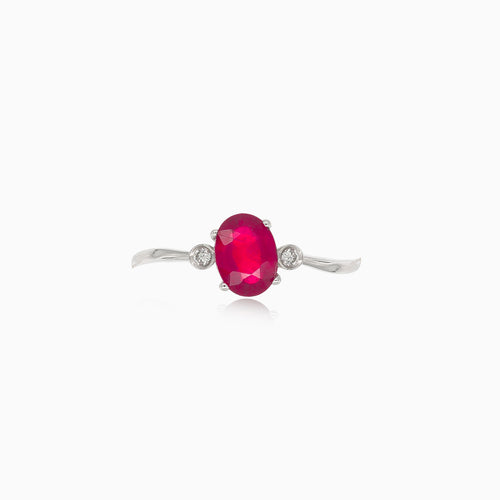 White gold oval ruby ring with diamonds