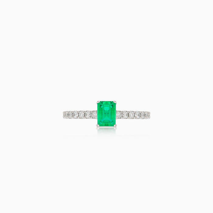 White gold diamond ring with emerald