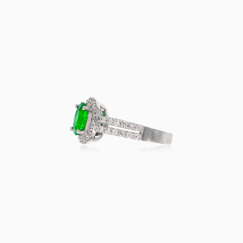 Elegant white gold diamond and emerald ring