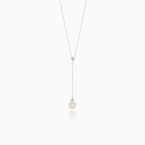 Diamond necklace with dangling pearl