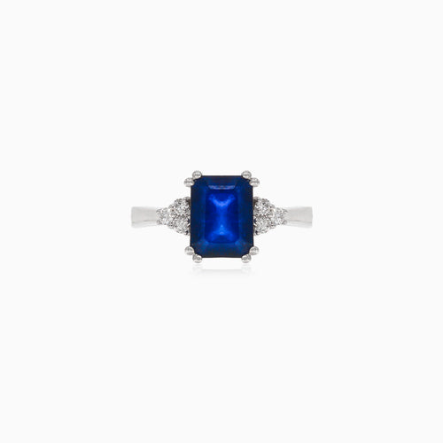 White gold diamond and blue sapphire ring