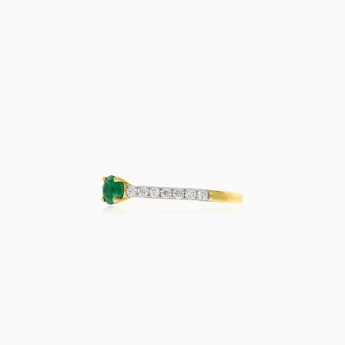 Elegant round cut emerald and diamond ring