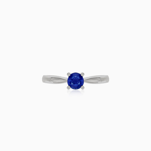 Simple white gold ring with sapphire