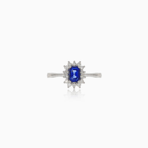 Diamond ring with sapphire