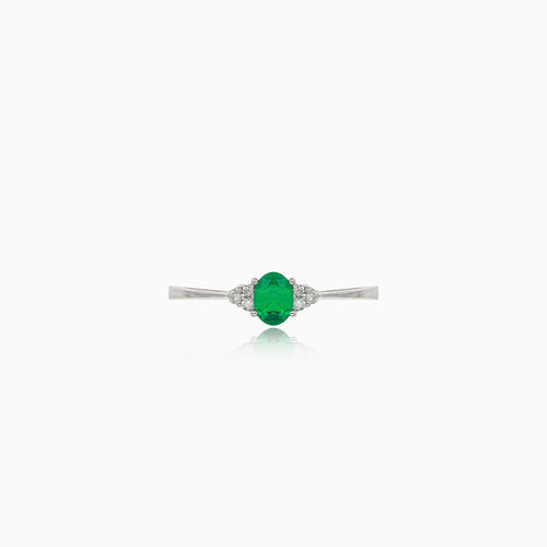 Emerald white gold ring with diamonds