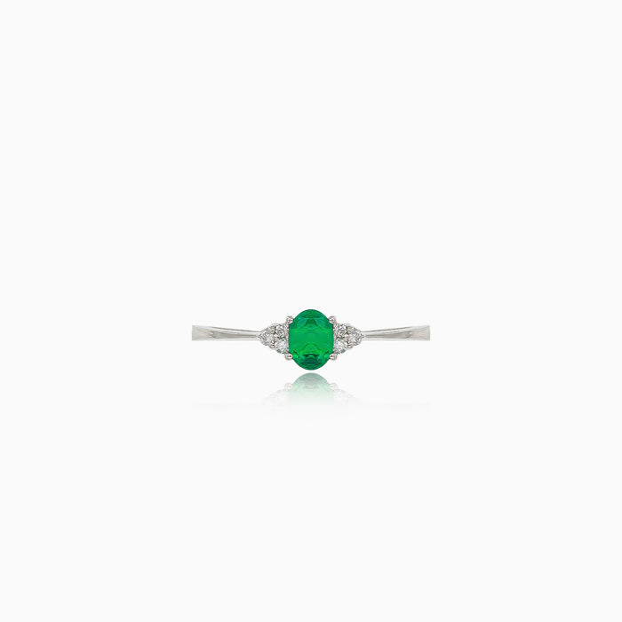 Emerald white gold ring with diamonds