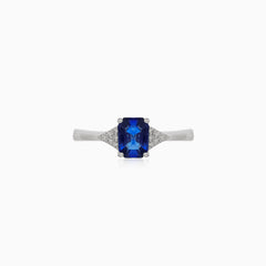 Stylish white gold ring with sapphire and diamonds