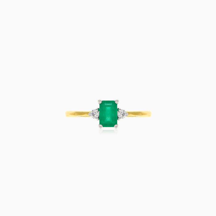 Bague élégante en or jaune avec diamants et émeraude