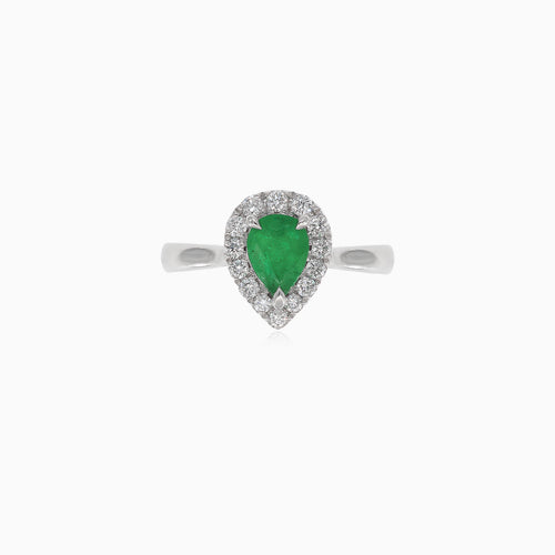 Elegant white gold women's ring with diamonds and emerald