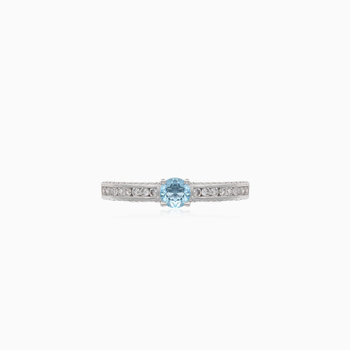 Elegant  white gold  ring with diamond and blue topaz