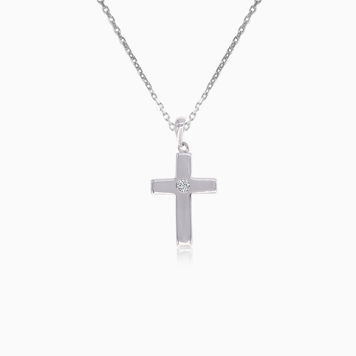 Colgante fino de cruz en oro blanco con diamante
