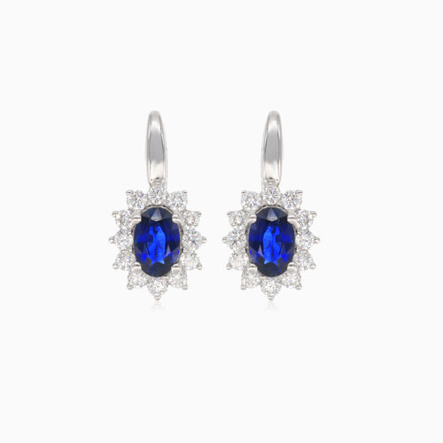Elegant white gold drop earrings with diamonds and blue sapphires
