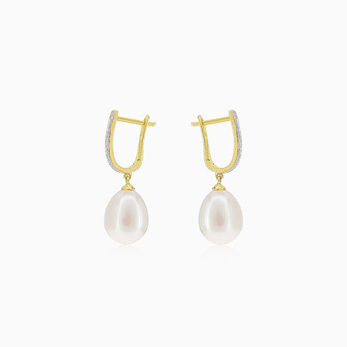Hanging gold pearl earrings with diamonds