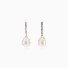 Hanging gold pearl earrings with diamonds