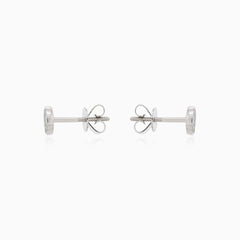 Dazzling round cut diamond earrings in lustrous white gold