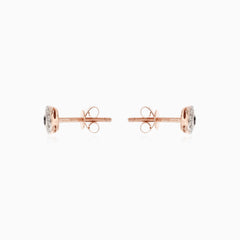 Stylish rose gold earrings with black and white diamonds