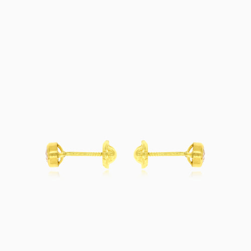 Yellow gold bezel set round brilliant cubic zirconia stud earrings