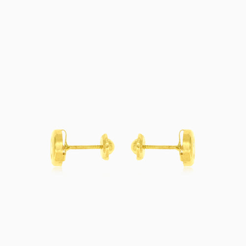 Bezel set gold stud earrings