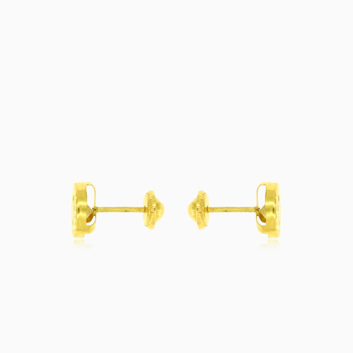 Lustrous gold with round cubic zirconia stud earrings