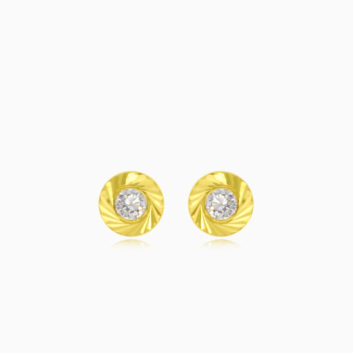 Luminöse goldene Glitzer-Ohrstecker