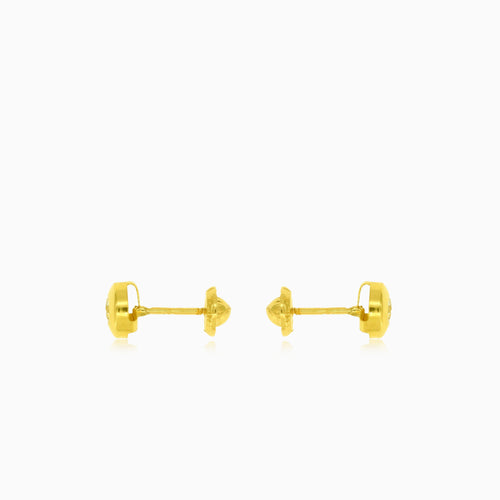 Gold bezel set round cubic zirconia stud earrings