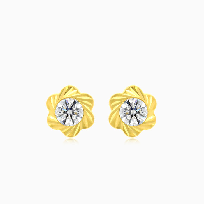 Pendientes de oro con flor y zirconia cúbica en el centro