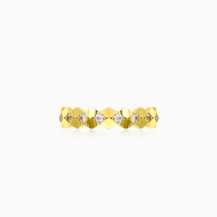 Curved gold ring with sparkling cubic zirconia