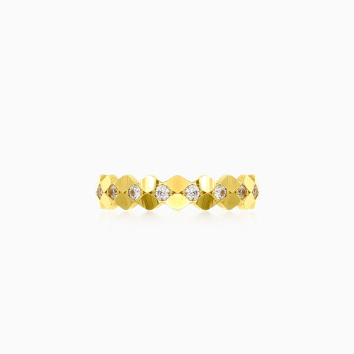 Curved gold ring with sparkling cubic zirconia