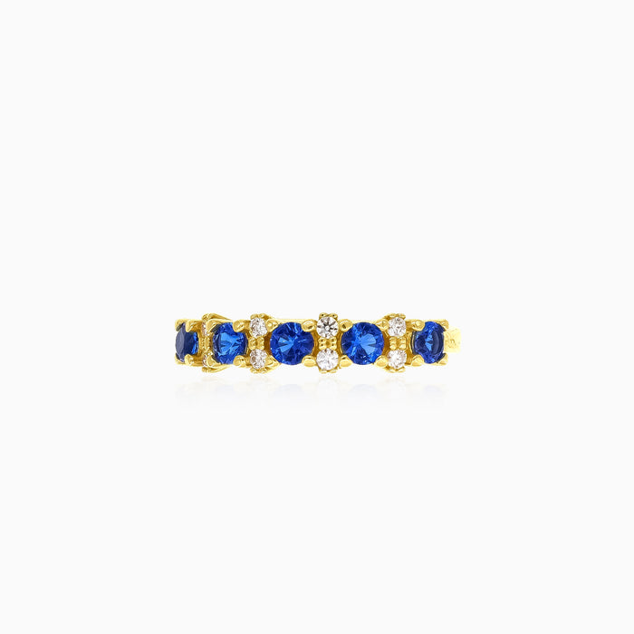 Goldring mit blauem Saphir und Zirkonia