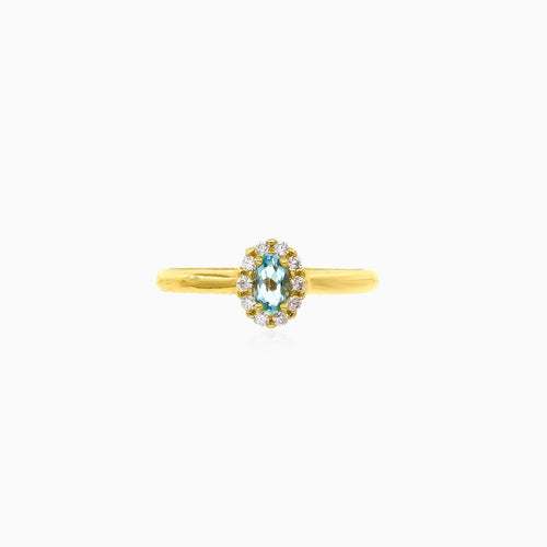 Prsten s modrým topazem ve žlutém zlatě