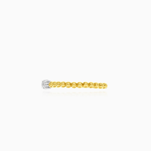 Yellow gold ring adorned with sparkling cubic zirconia