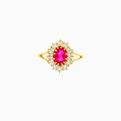 Lustrous cubic zirconia and oval ruby yellow gold ring