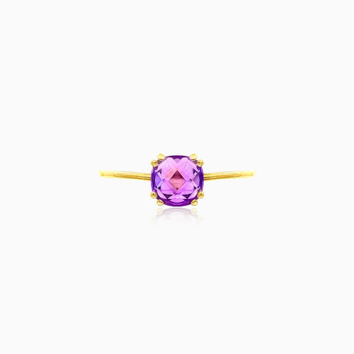 Yellow gold ring with purple topaz