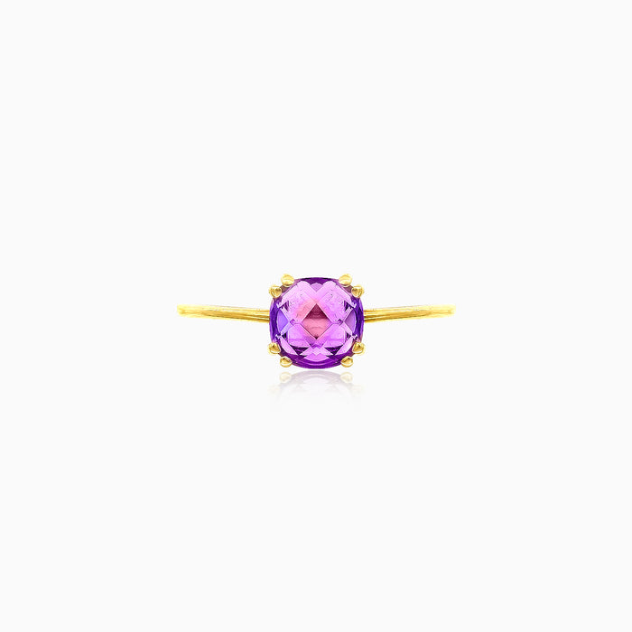 Bague en or jaune avec topaze violette