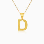 Gold pendant of letter D