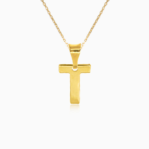 Gold pendant of letter "T"