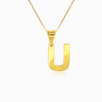 Zlatý přívěsek písmene "U"