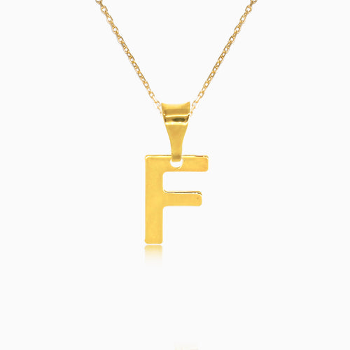 Gold pendant of letter "F"